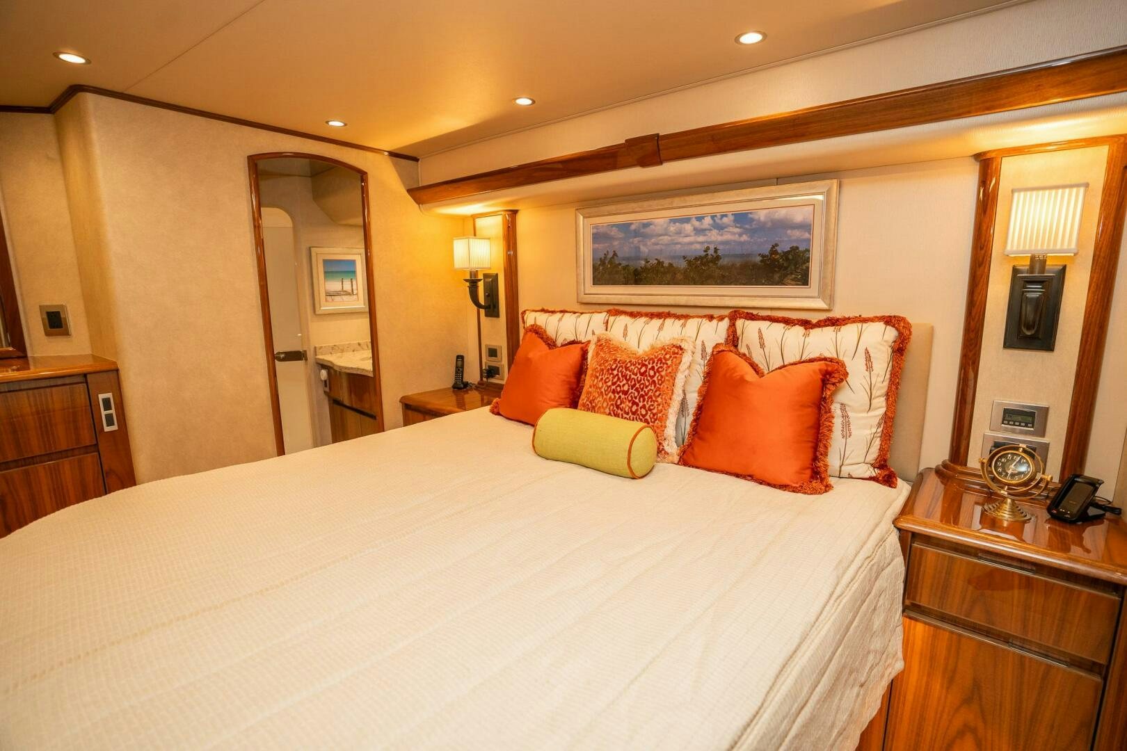 a hotel room with a bed and a desk aboard VOODOO Yacht for Sale