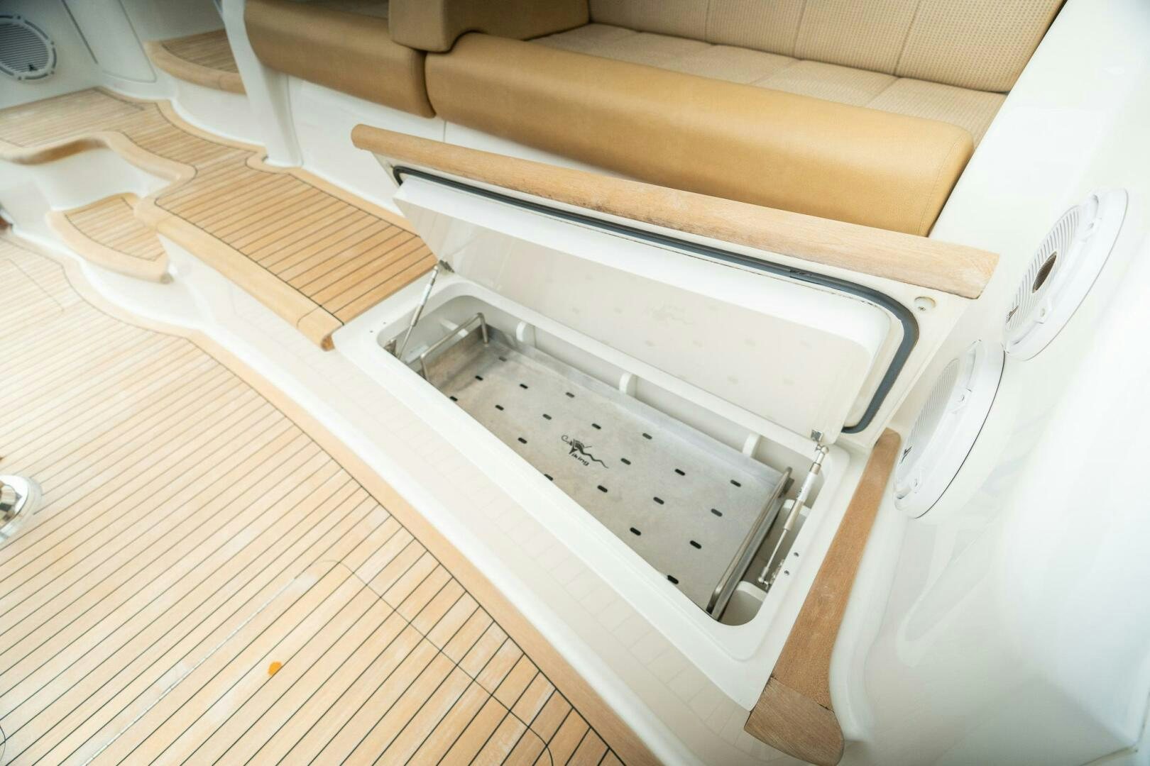 a white sink in a white kitchen aboard VOODOO Yacht for Sale