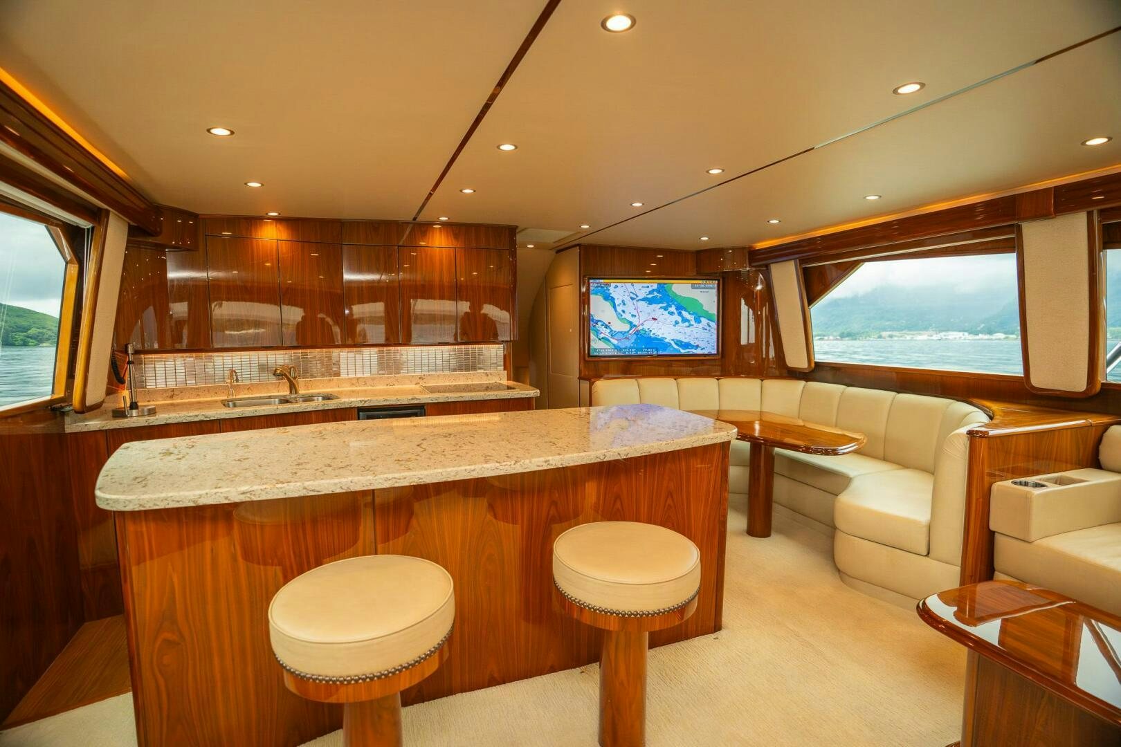 a large kitchen with a large island aboard VOODOO Yacht for Sale