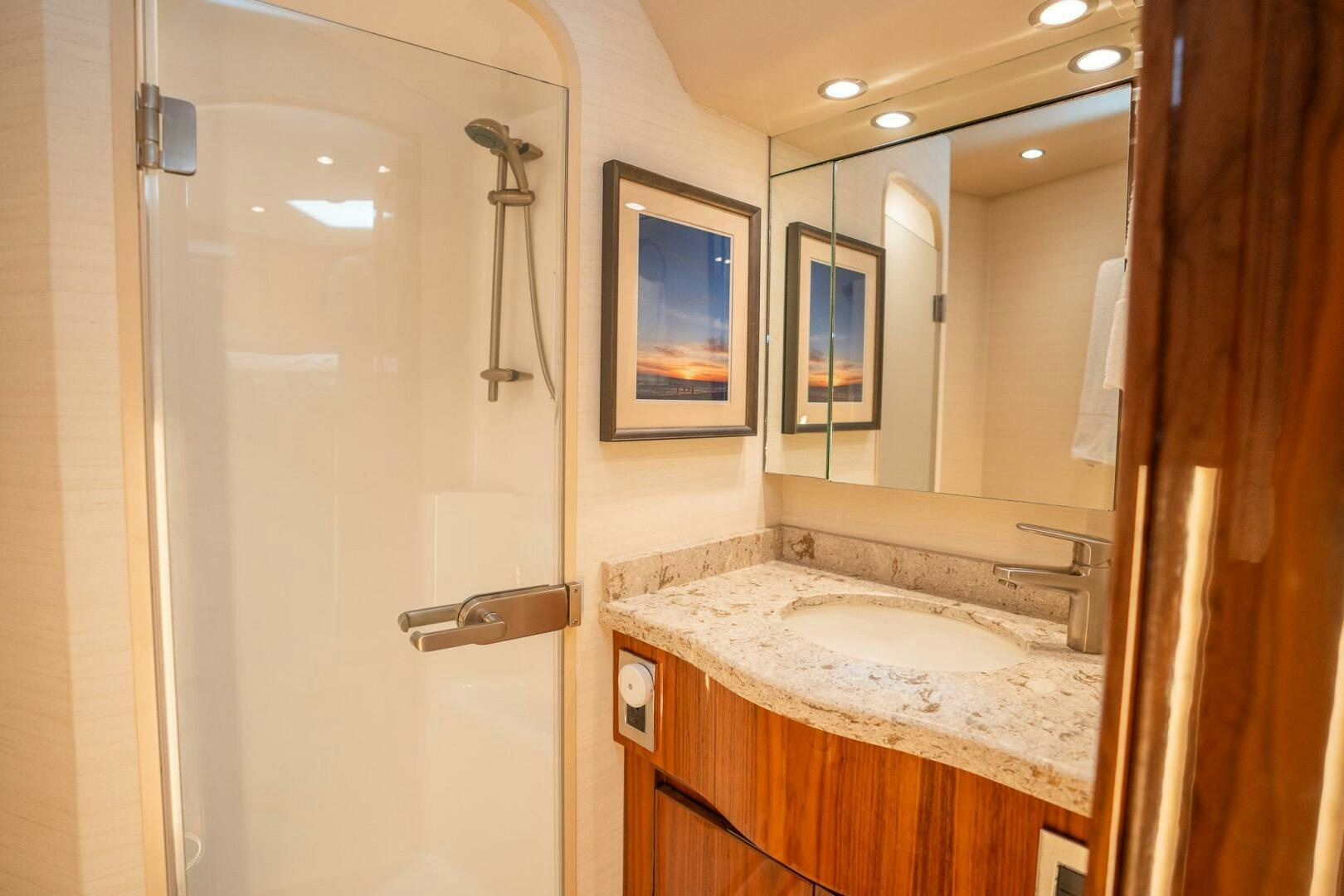 a bathroom with a sink and a mirror aboard VOODOO Yacht for Sale