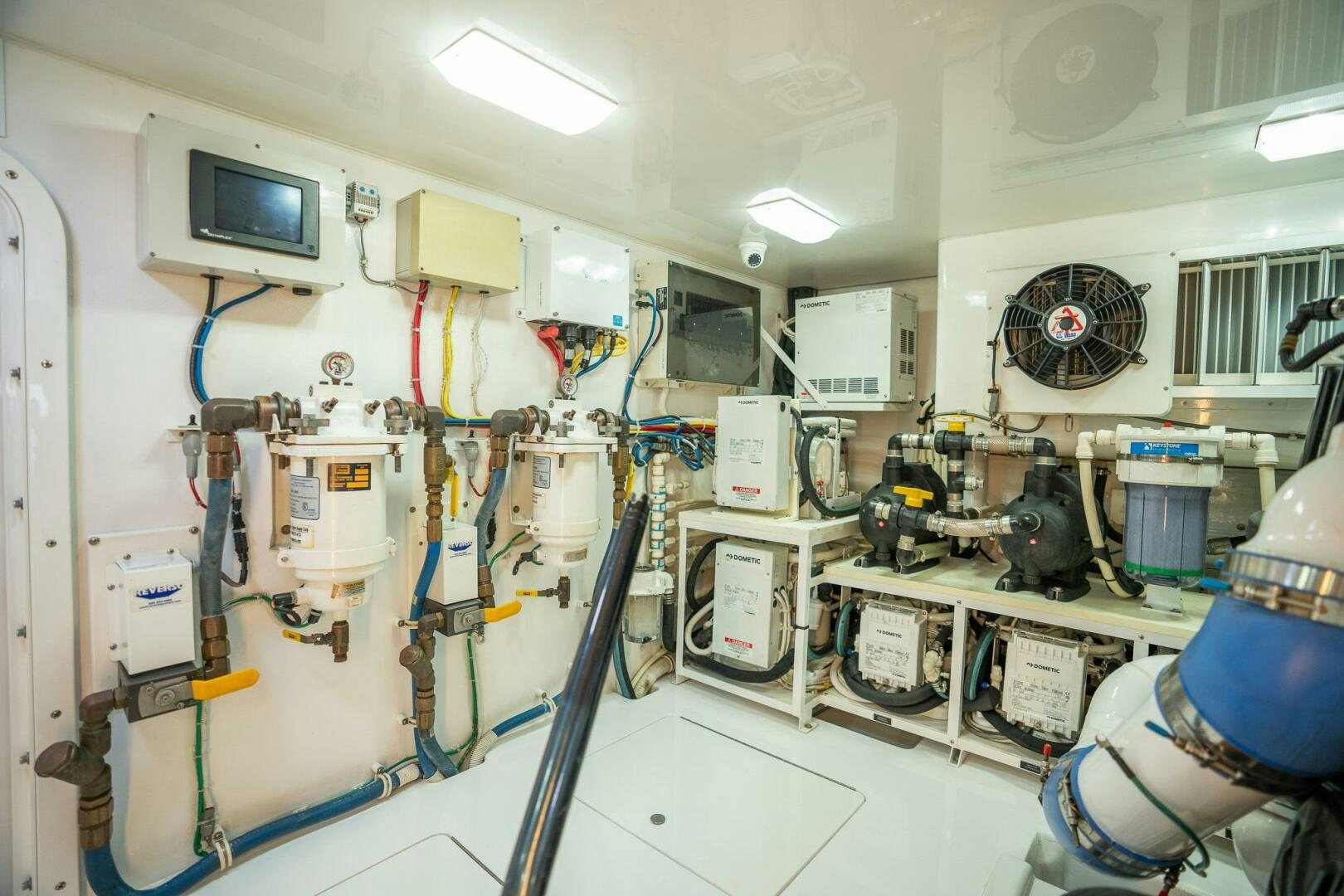 a room with several machines aboard VOODOO Yacht for Sale