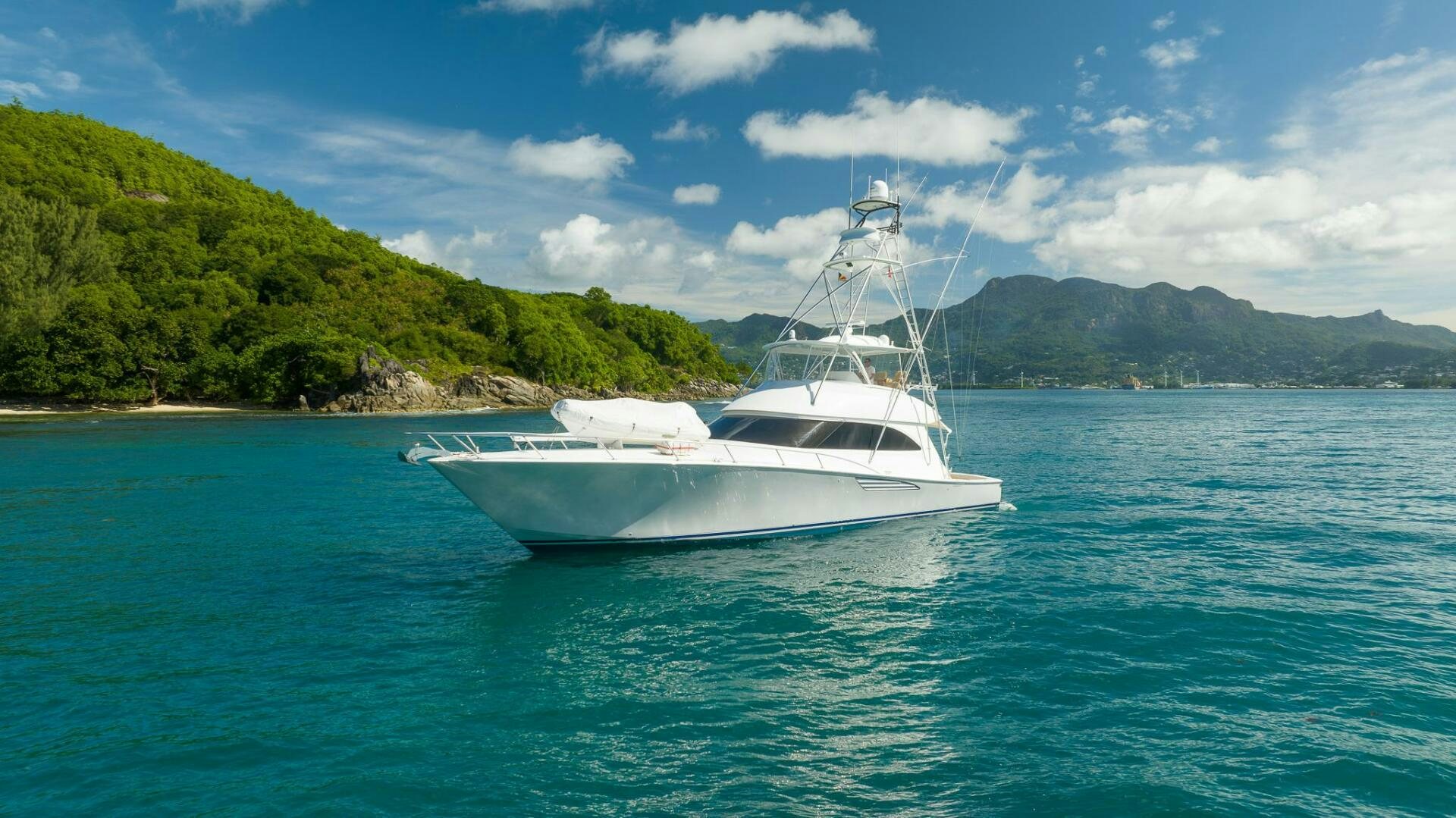 a white boat in the water aboard VOODOO Yacht for Sale