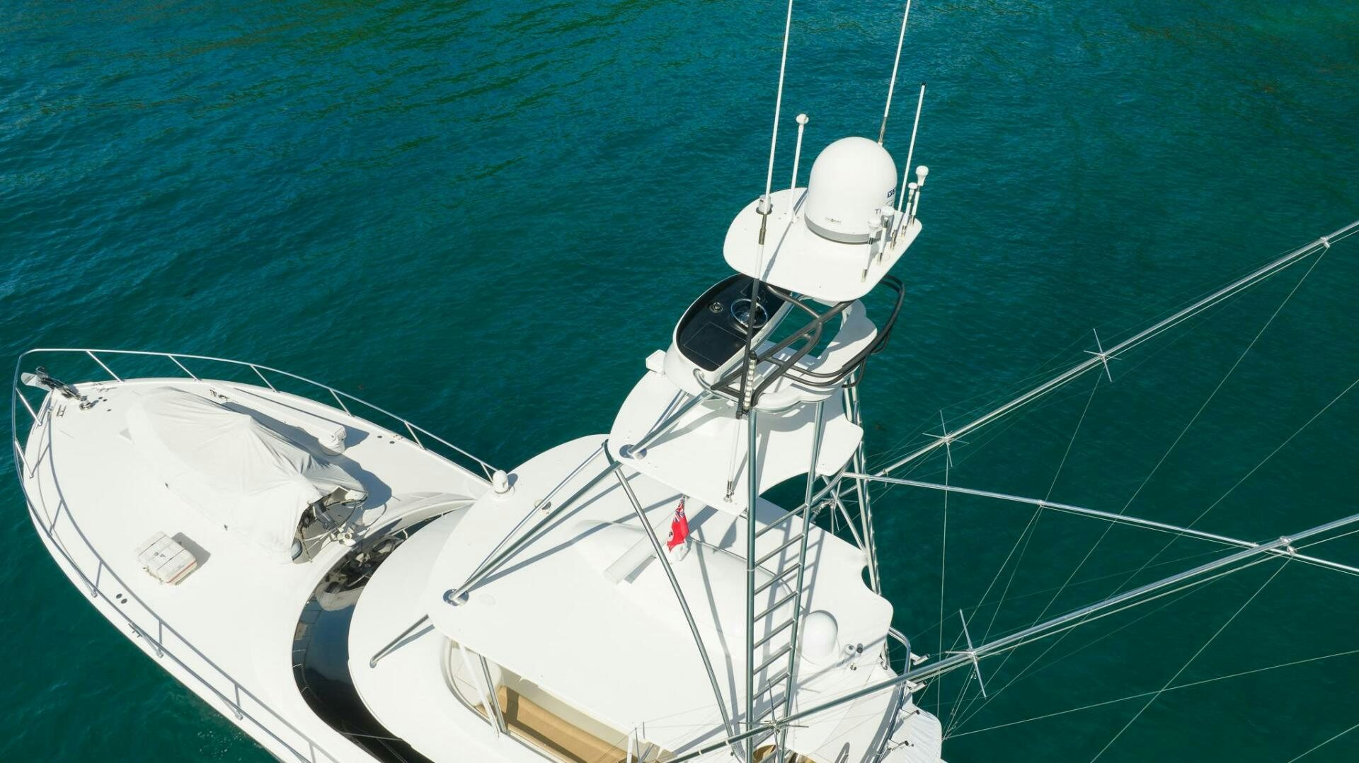 a white boat in the water aboard VOODOO Yacht for Sale