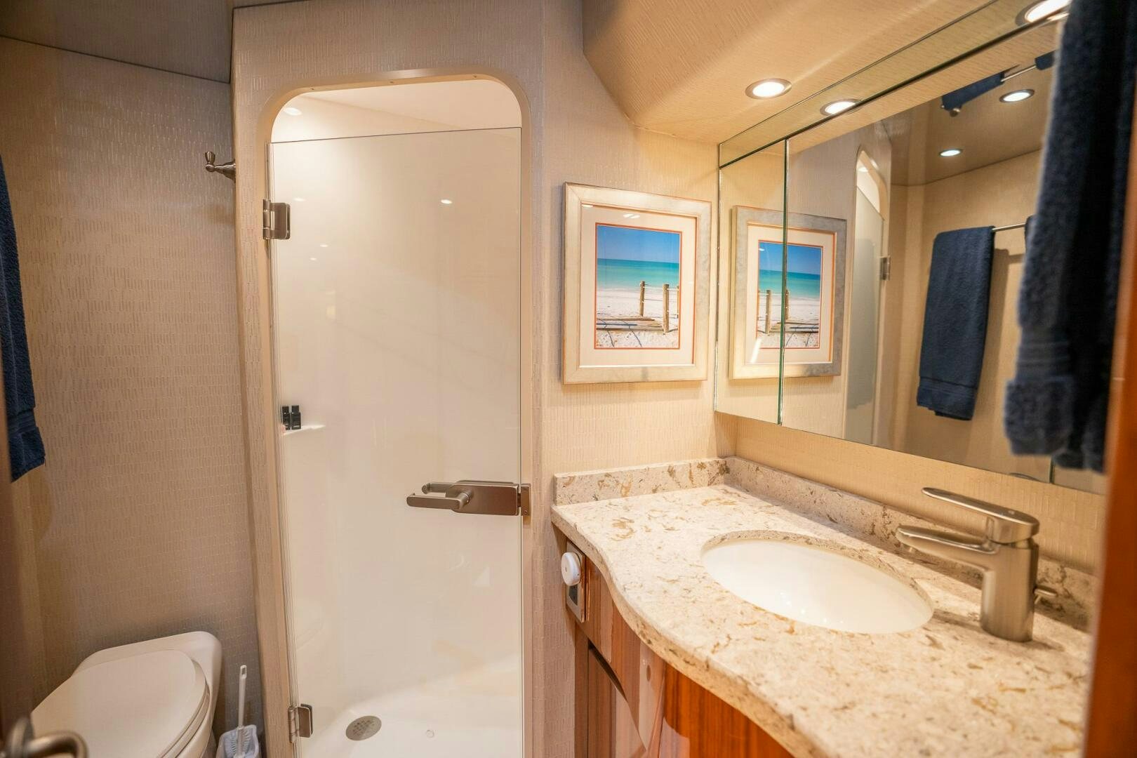 a bathroom with a sink and a mirror aboard VOODOO Yacht for Sale