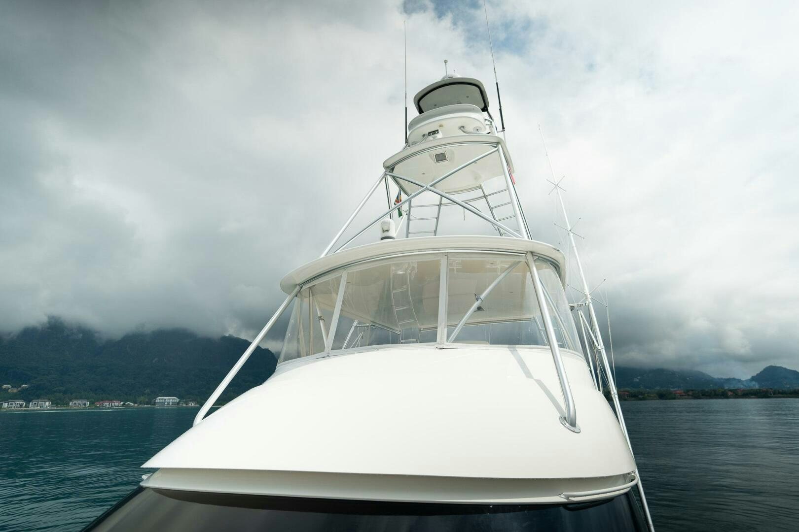 a white yacht on the water aboard VOODOO Yacht for Sale