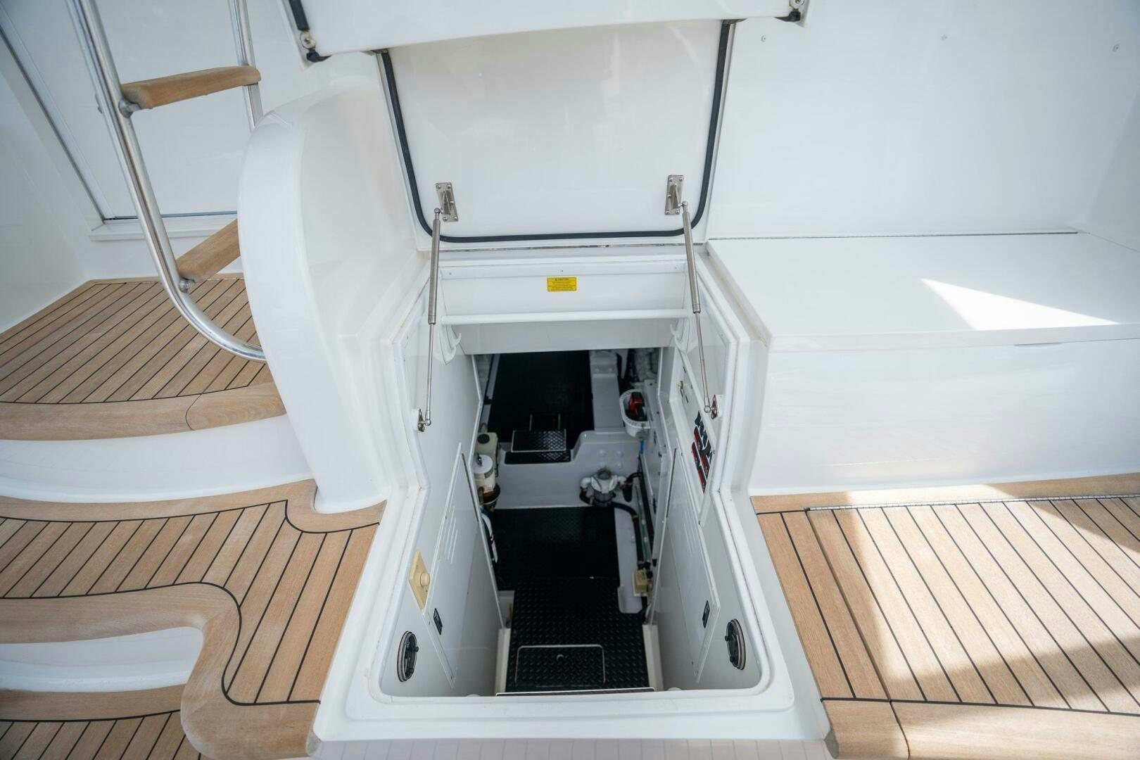 a white machine with a vent aboard VOODOO Yacht for Sale
