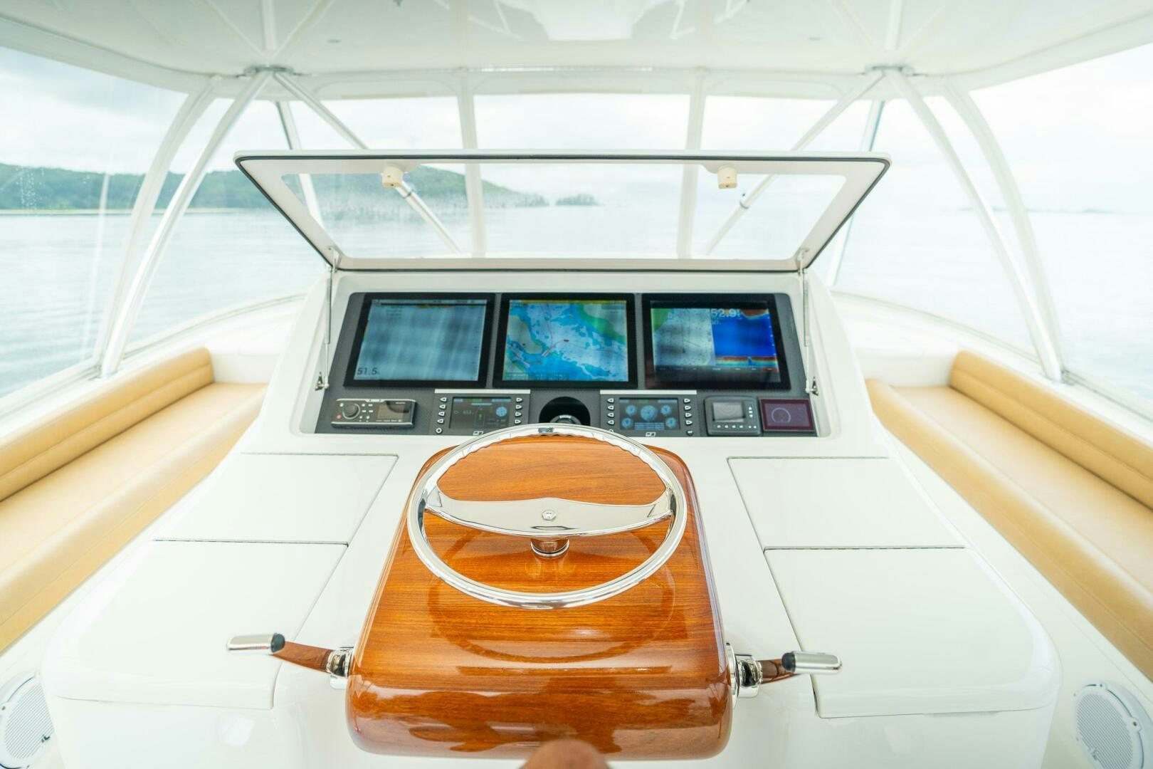 a white and orange cockpit aboard VOODOO Yacht for Sale