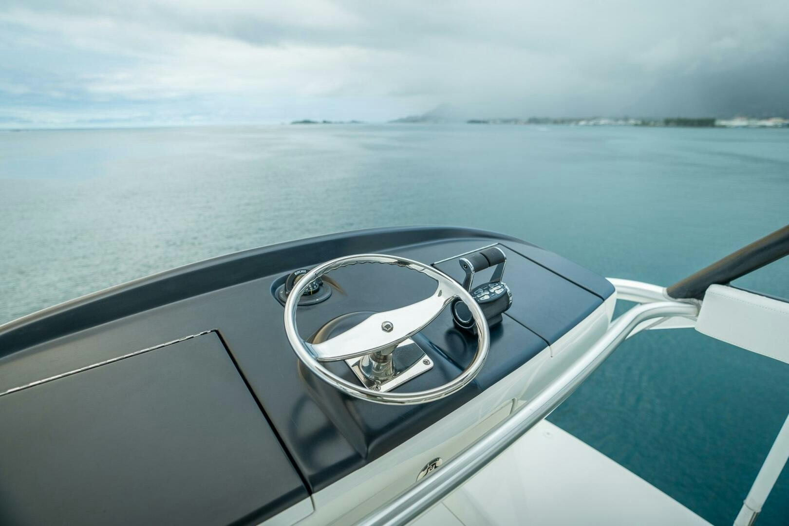 a steering wheel on a boat aboard VOODOO Yacht for Sale