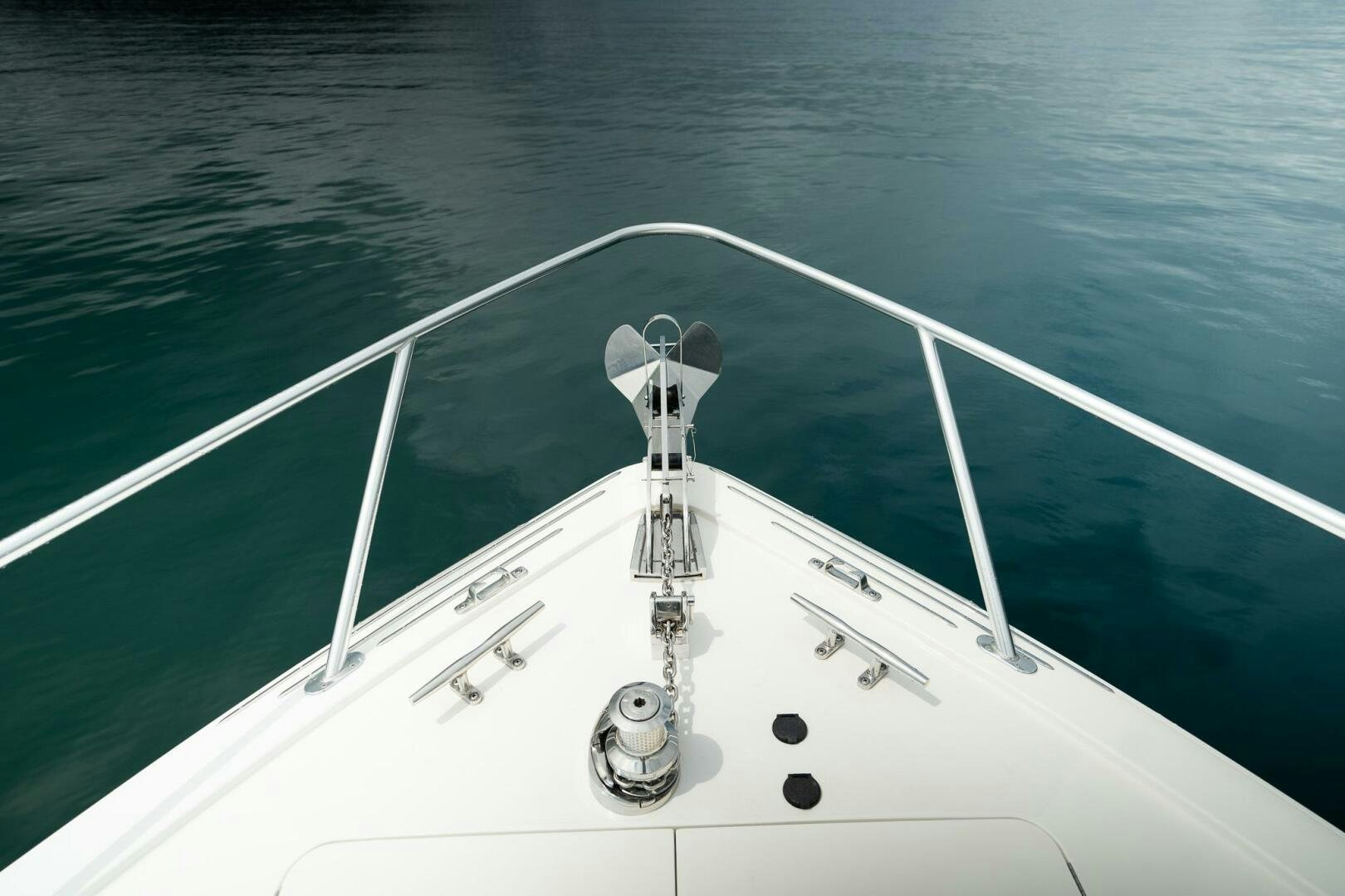 a white boat with a propeller aboard VOODOO Yacht for Sale
