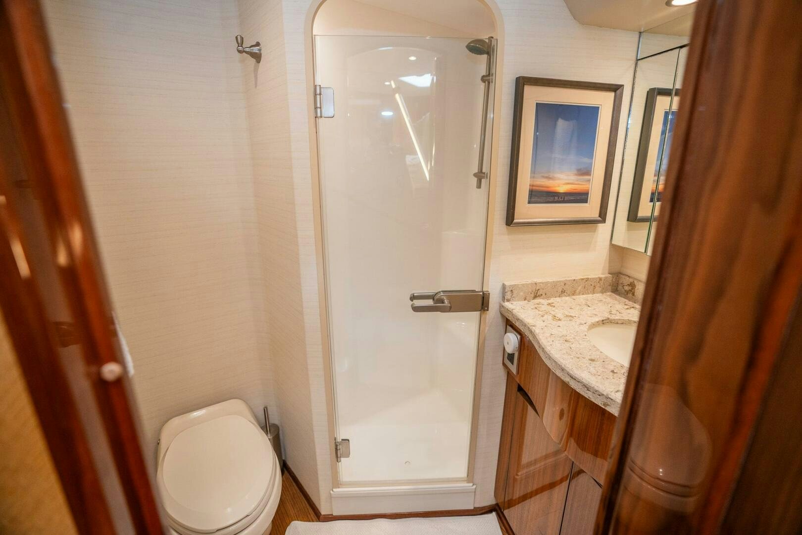 a bathroom with a shower and toilet aboard VOODOO Yacht for Sale