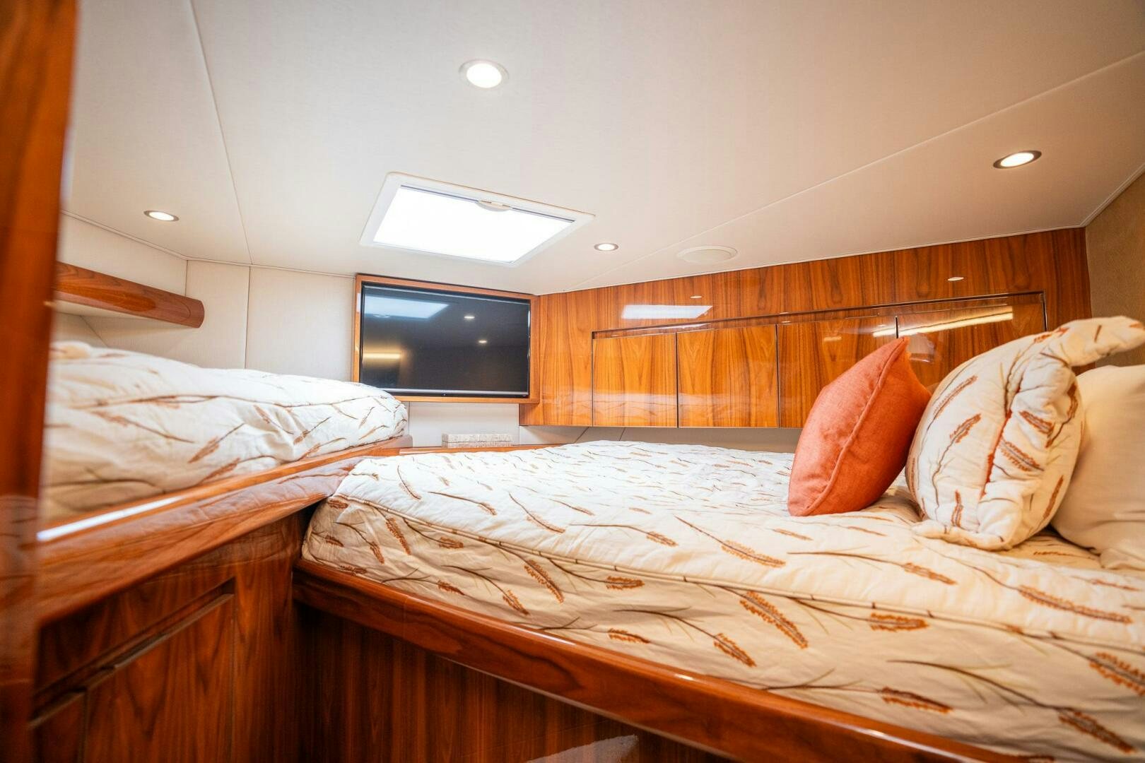 a room with two beds aboard VOODOO Yacht for Sale