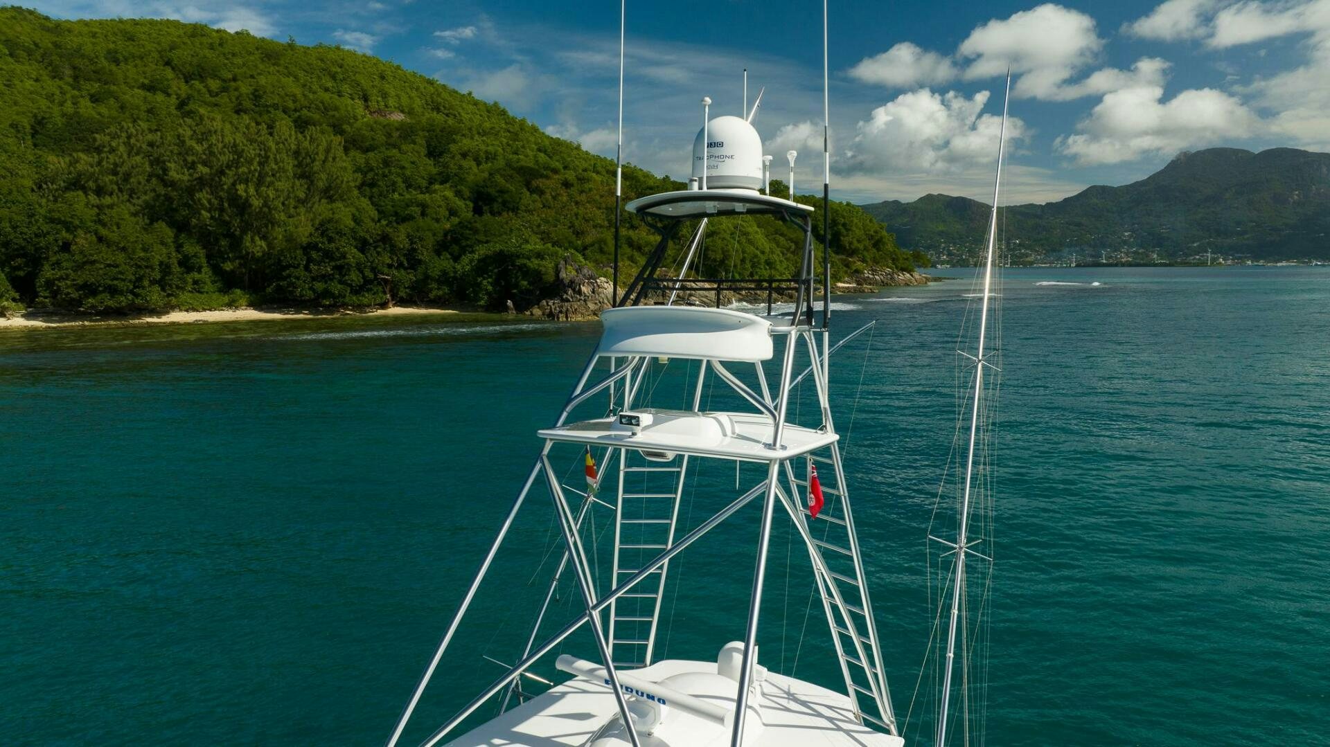 a white boat on the water aboard VOODOO Yacht for Sale