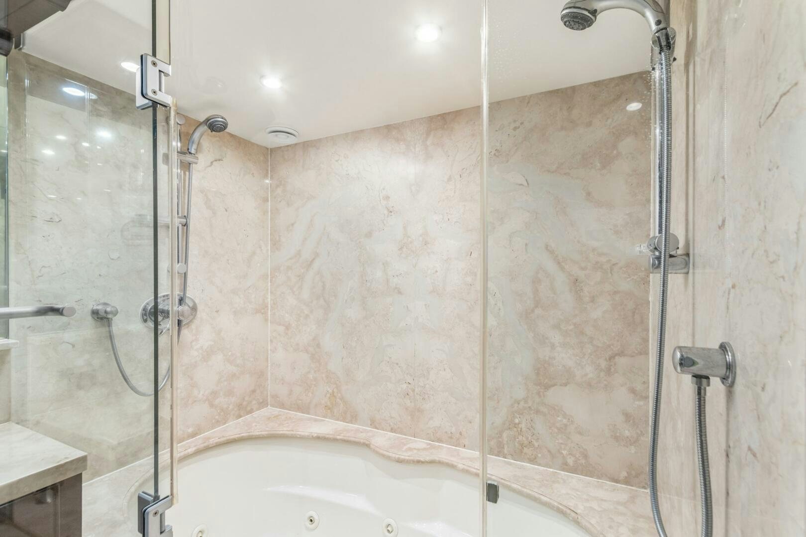 a bathroom with a shower and a sink aboard HIGH LIFE Yacht for Sale