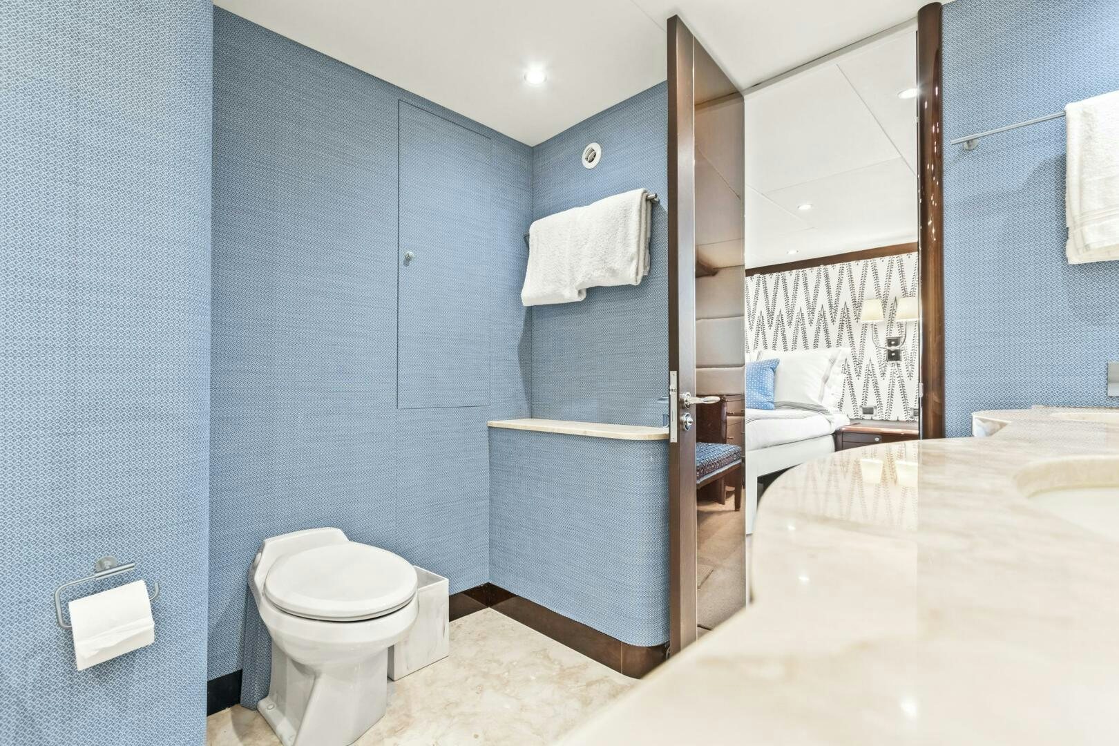 a bathroom with a tub sink and toilet aboard HIGH LIFE Yacht for Sale