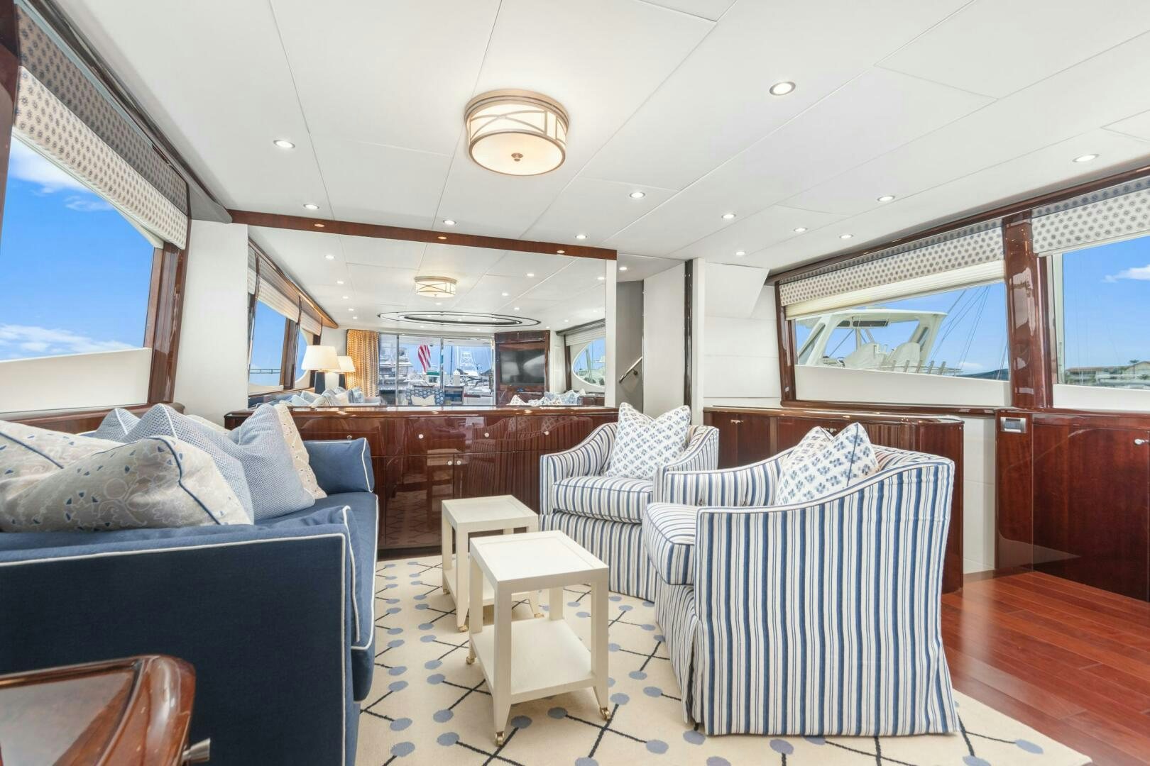 a living room with a couch and a table aboard HIGH LIFE Yacht for Sale