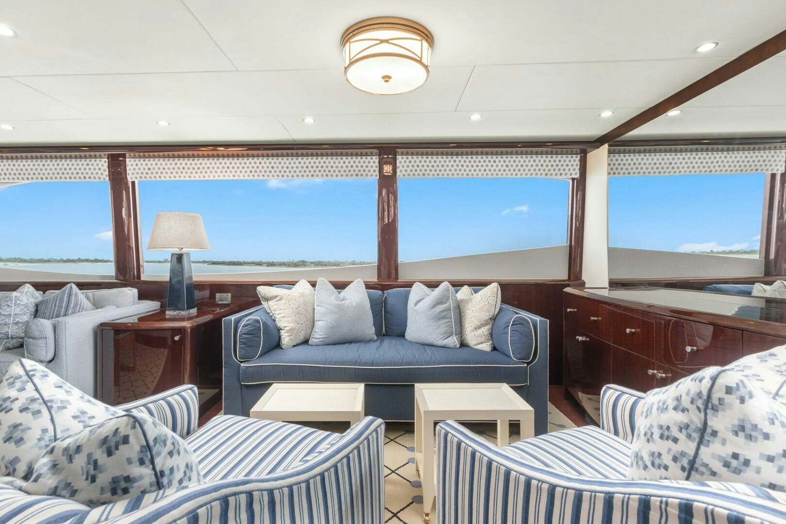a living room with a large window aboard HIGH LIFE Yacht for Sale