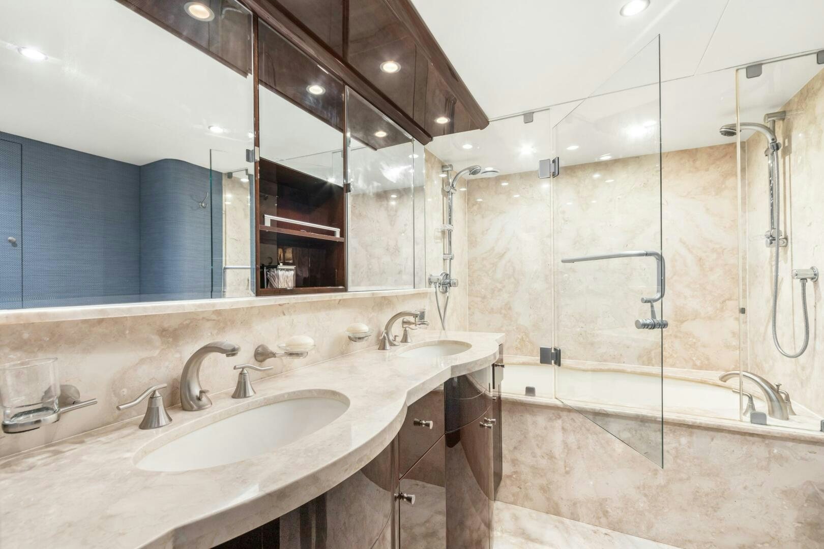 a bathroom with a large mirror aboard HIGH LIFE Yacht for Sale