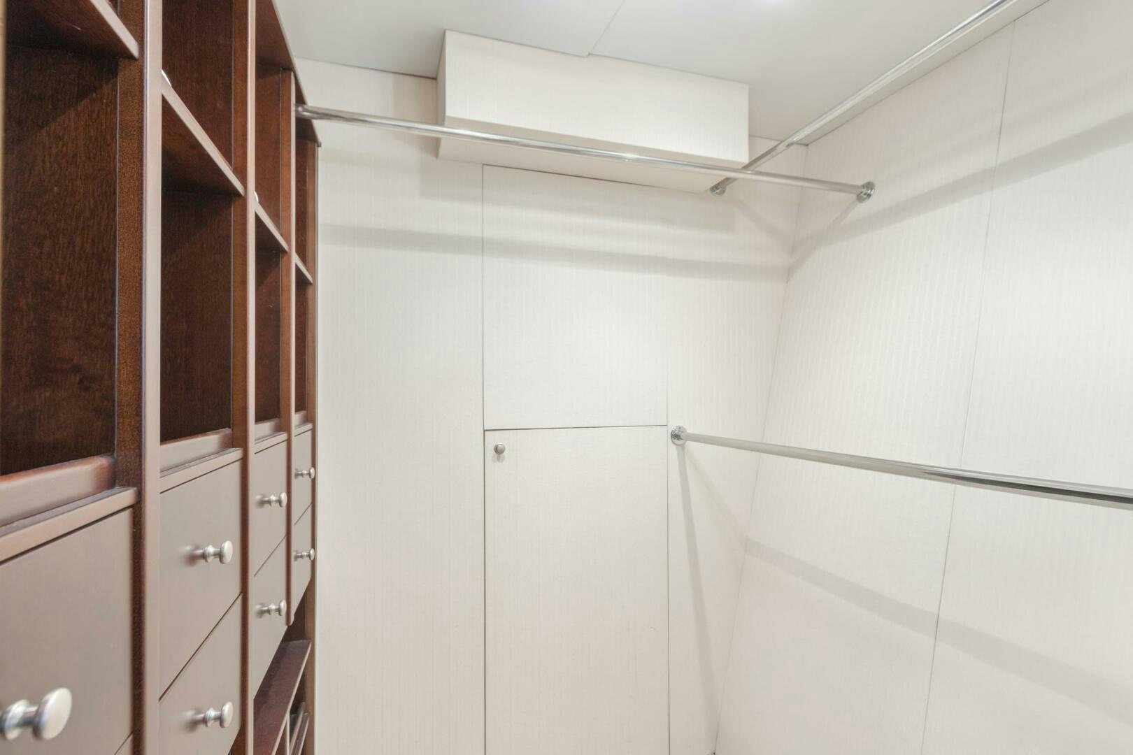 a room with white cabinets aboard HIGH LIFE Yacht for Sale