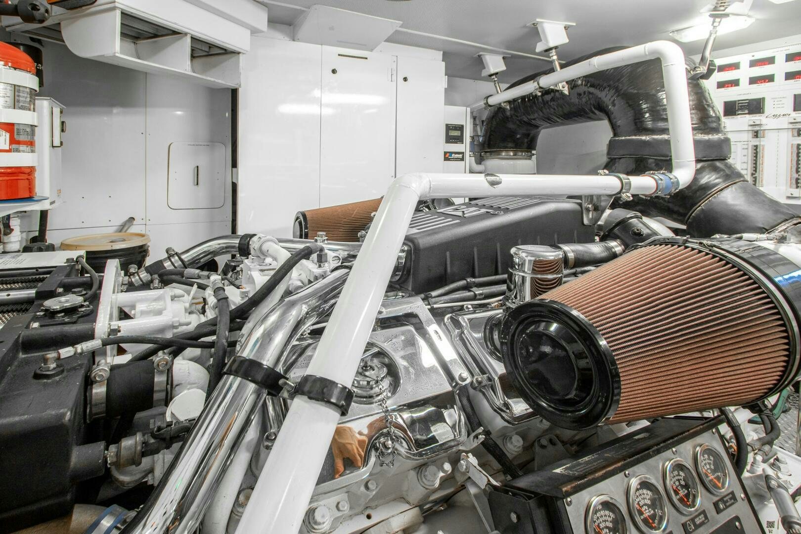 a car in a garage aboard HIGH LIFE Yacht for Sale