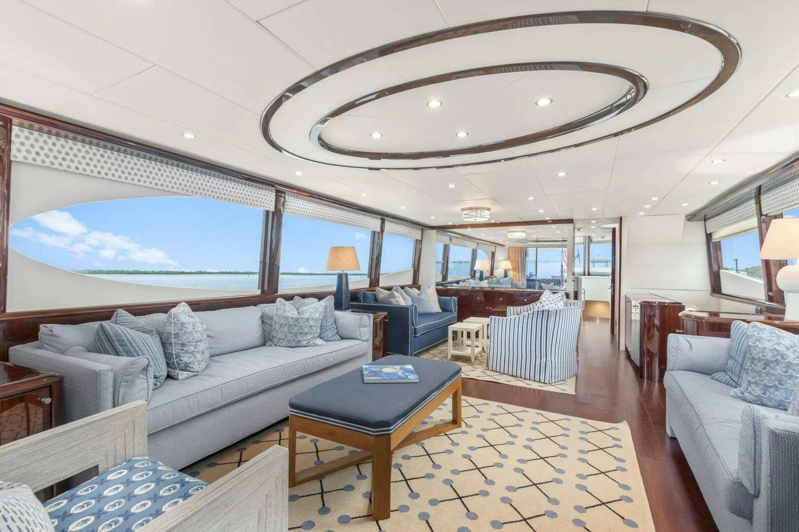 a large living room with a large glass ceiling aboard HIGH LIFE Yacht for Sale