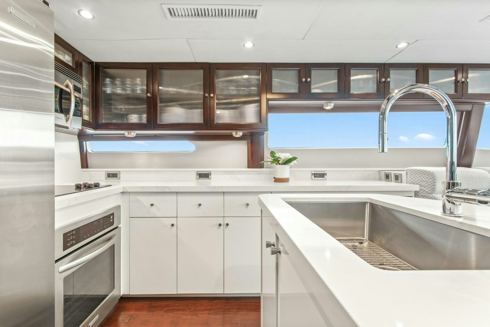 a kitchen with a large window aboard HIGH LIFE Yacht for Sale