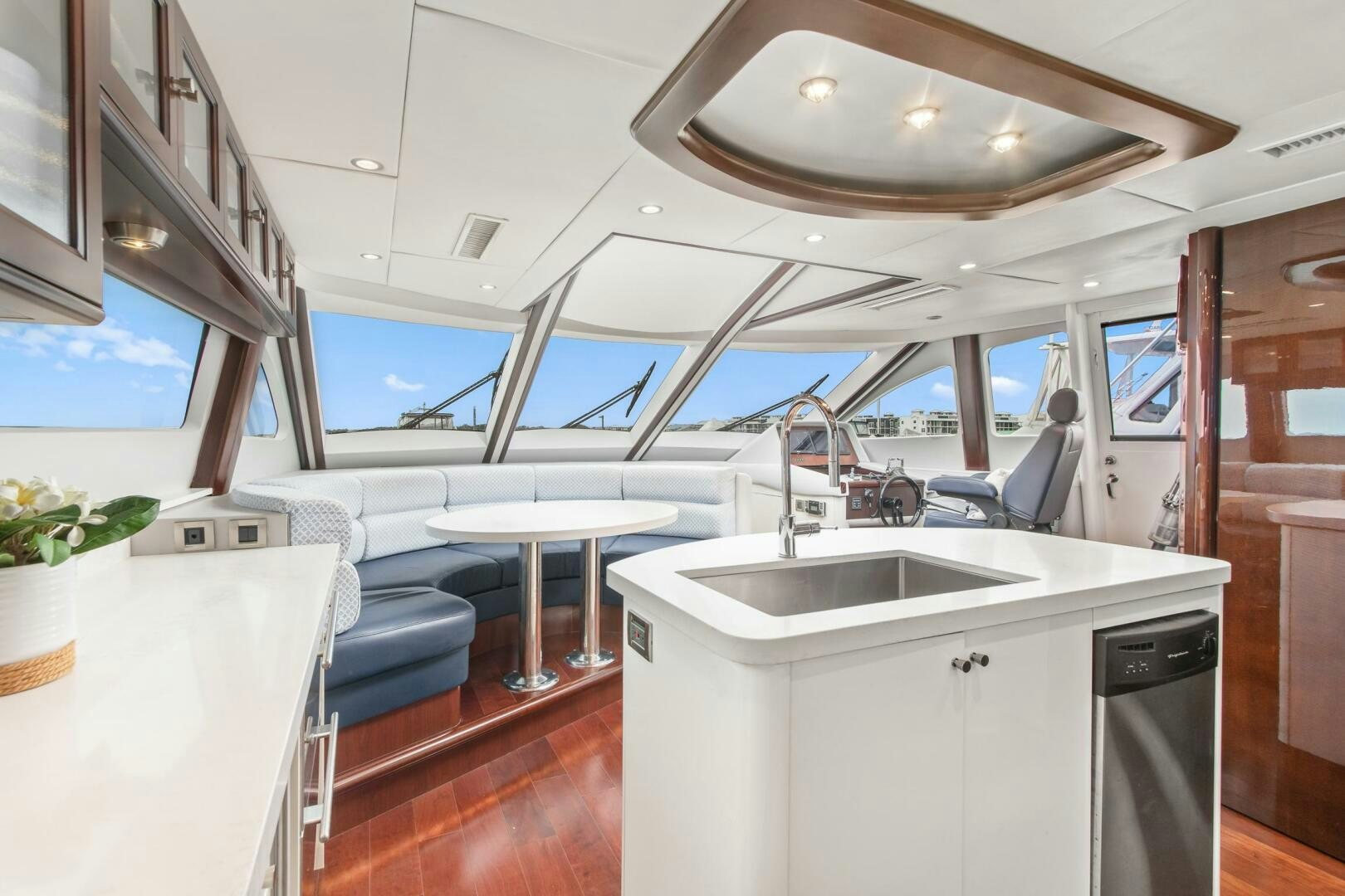 a kitchen with a sink and a table aboard HIGH LIFE Yacht for Sale