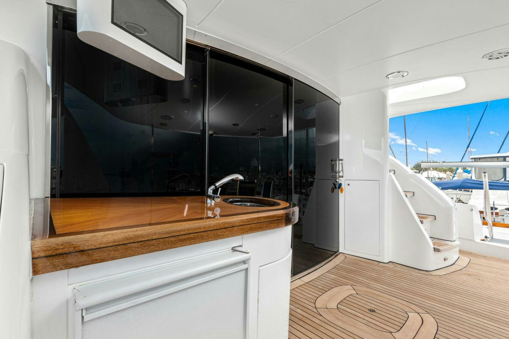 a kitchen with a large black stove aboard HIGH LIFE Yacht for Sale