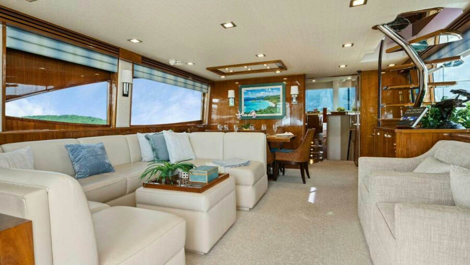 a living room with a couch and a tv aboard AMORE Yacht for Sale