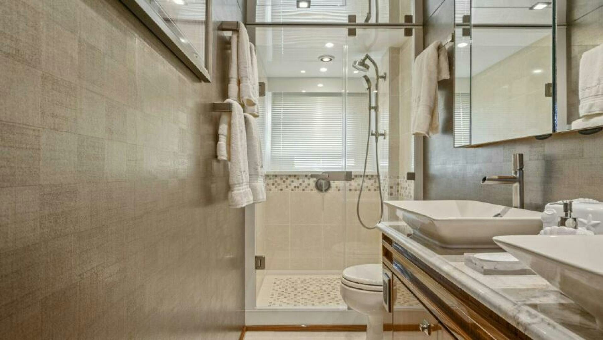 a bathroom with a sink and a toilet aboard AMORE Yacht for Sale