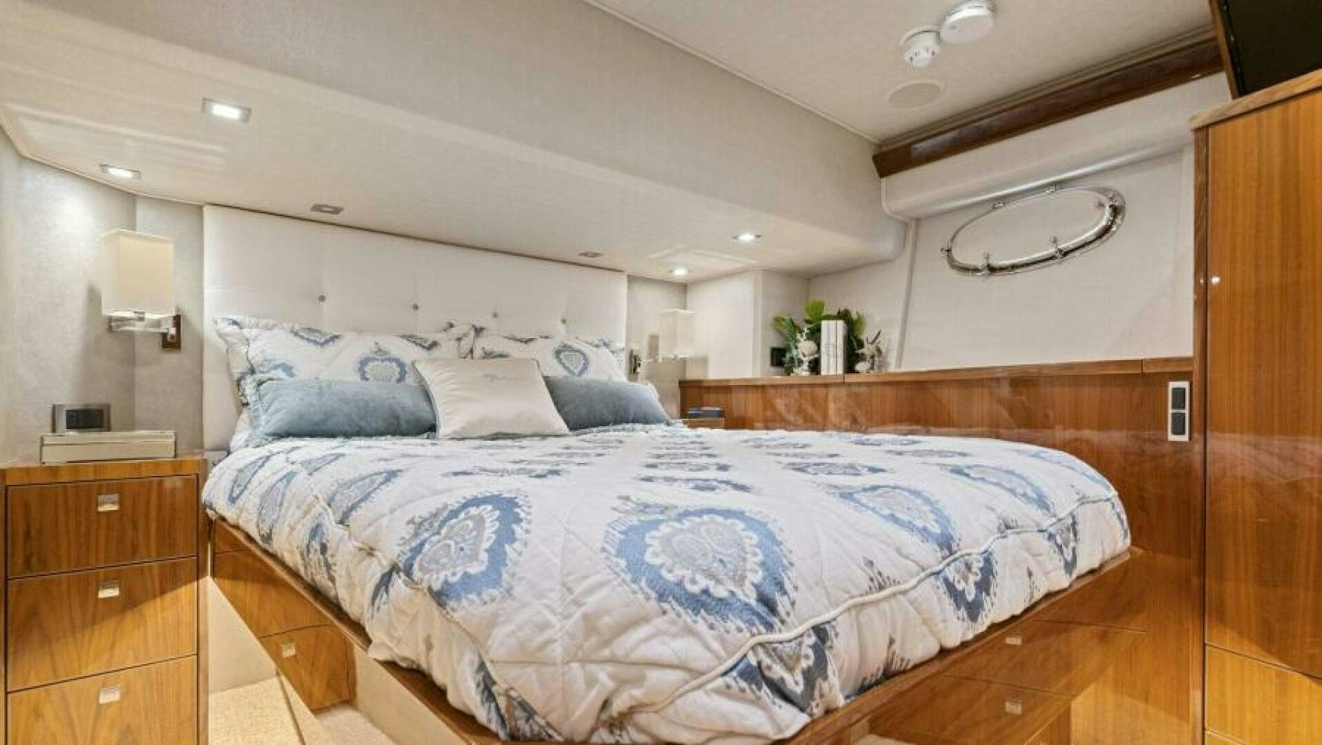 a bed in a room aboard AMORE Yacht for Sale