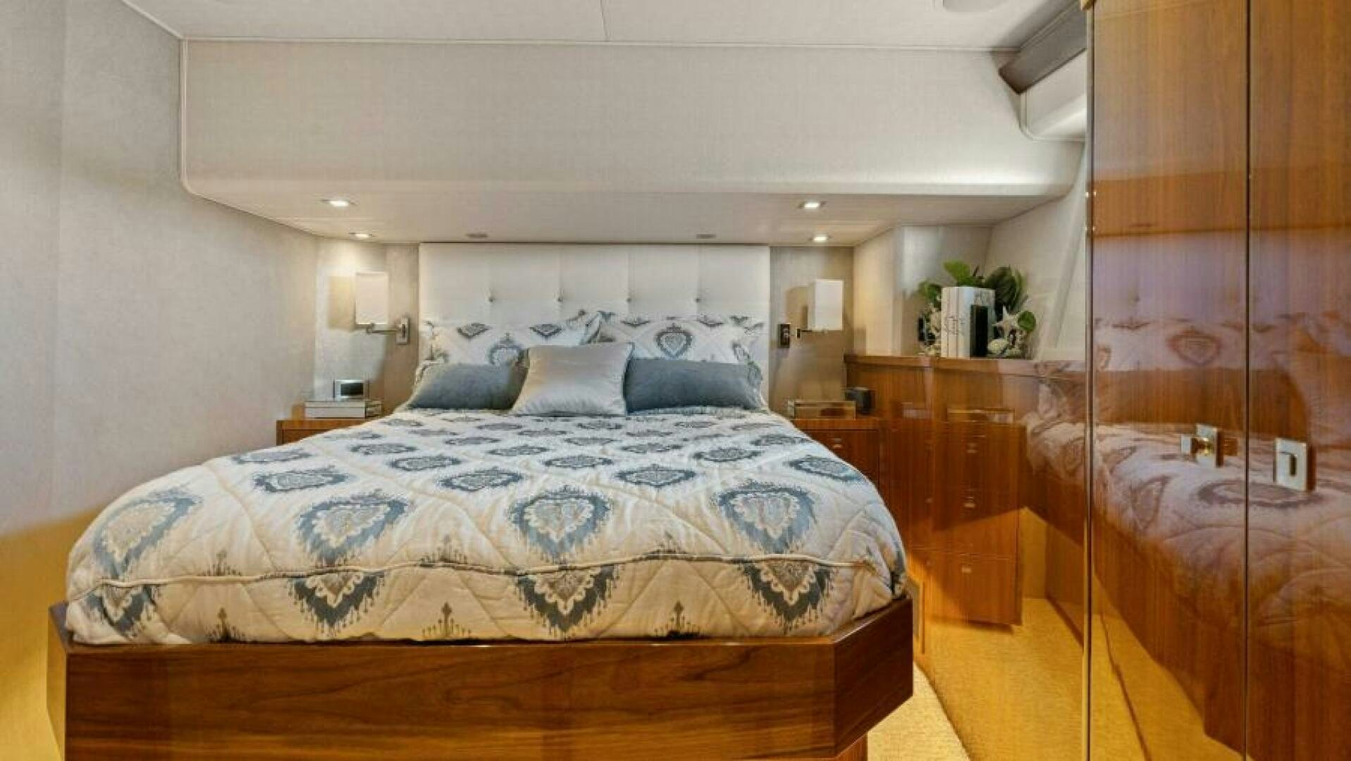 a bed in a room aboard AMORE Yacht for Sale