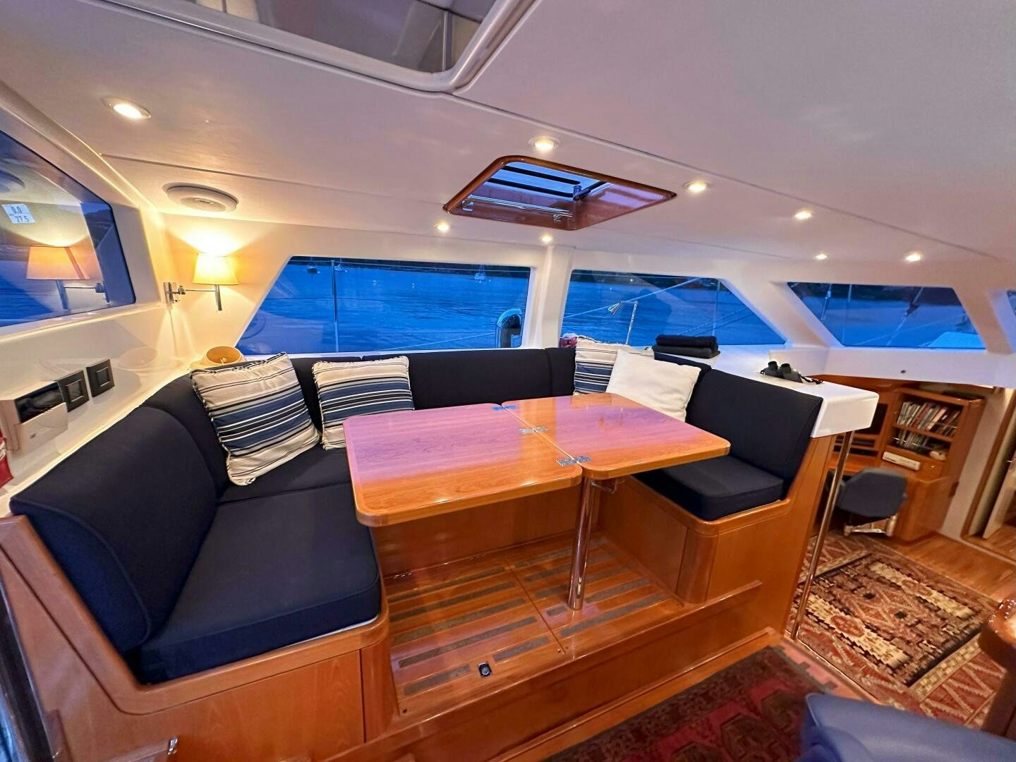 a room with a couch and a table aboard LEONORE Yacht for Sale