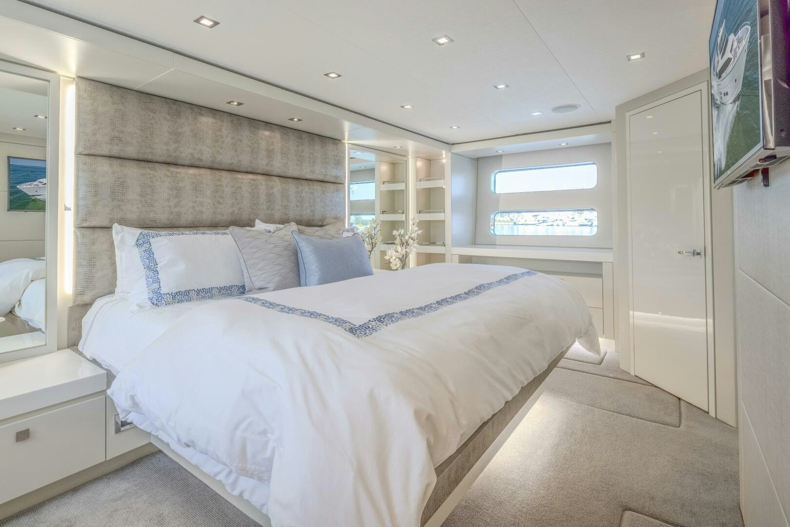 a large bed in a room aboard IMAGINE Yacht for Sale