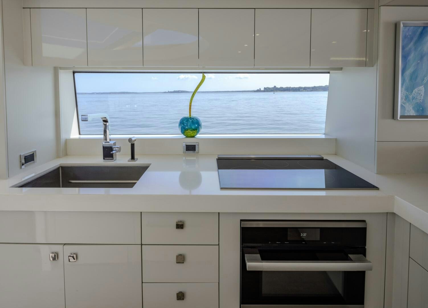 a kitchen with a window aboard IMAGINE Yacht for Sale