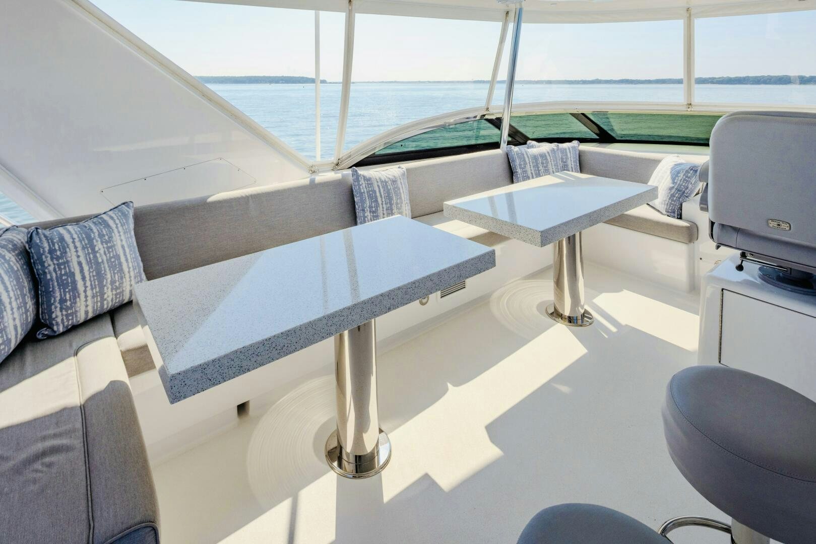 a bed with a desk and a chair aboard IMAGINE Yacht for Sale
