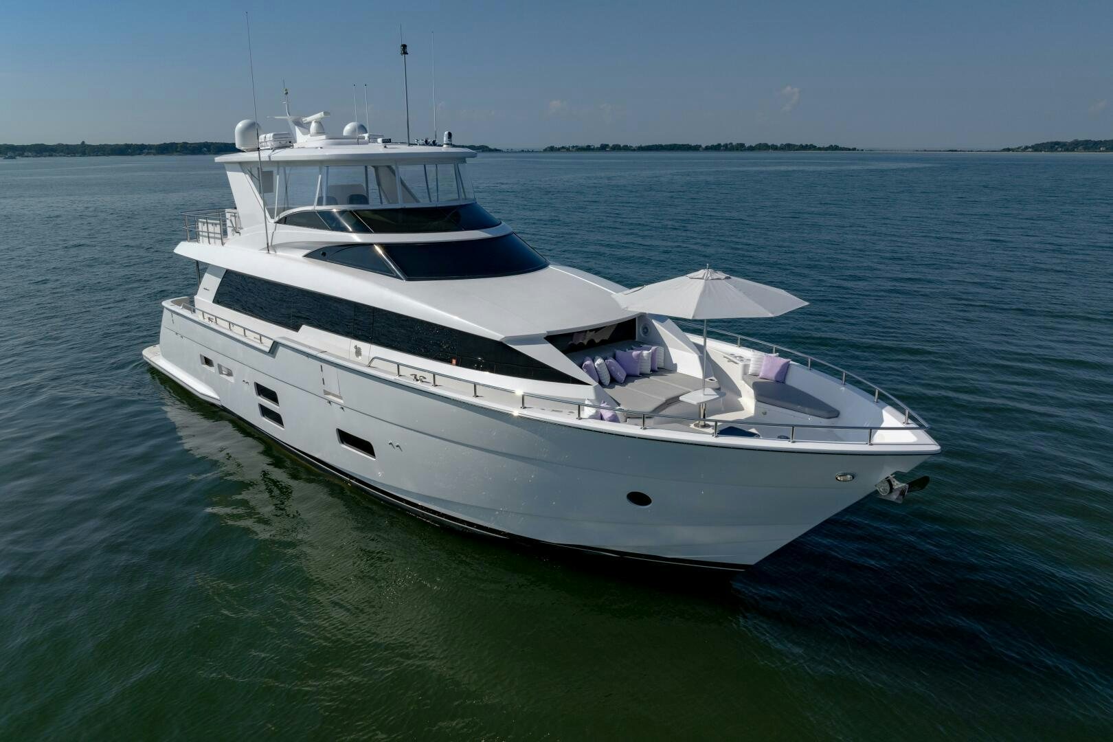 a white boat in the water aboard IMAGINE Yacht for Sale