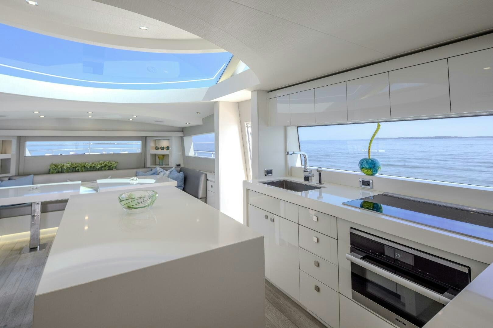 a kitchen with a large island aboard IMAGINE Yacht for Sale