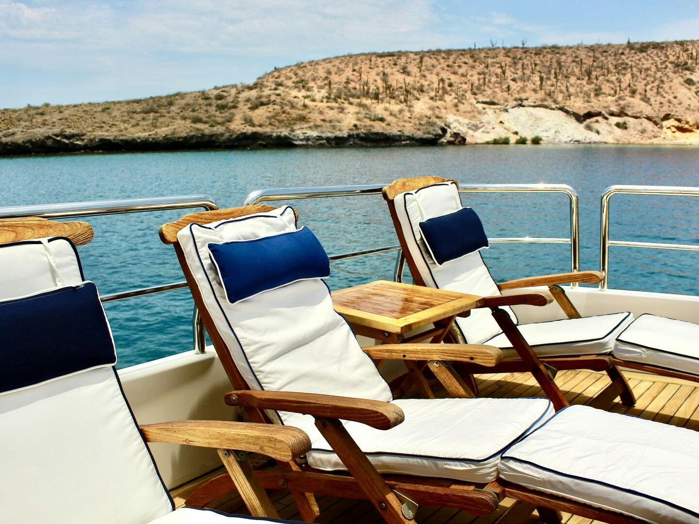 a row of boats on a lake aboard GARI Yacht for Sale