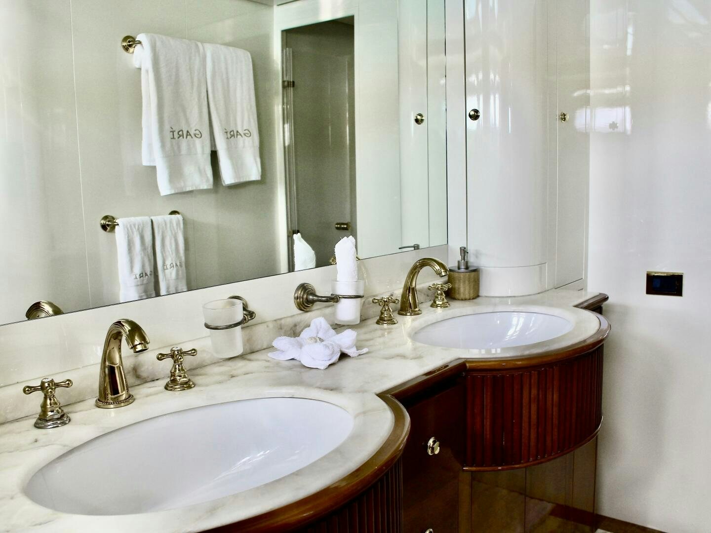 a bathroom with two sinks aboard GARI Yacht for Sale