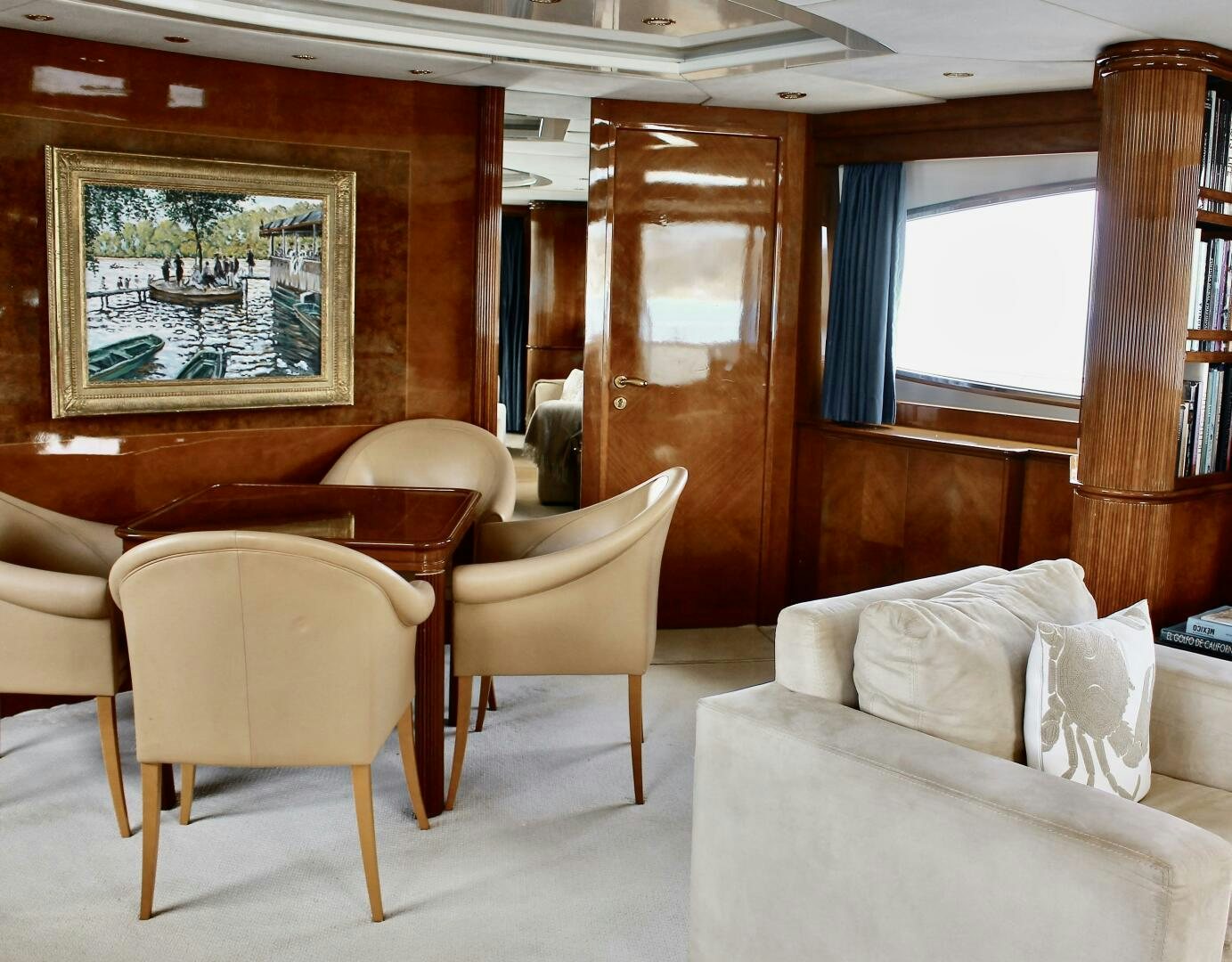 a living room with a couch and chairs aboard GARI Yacht for Sale