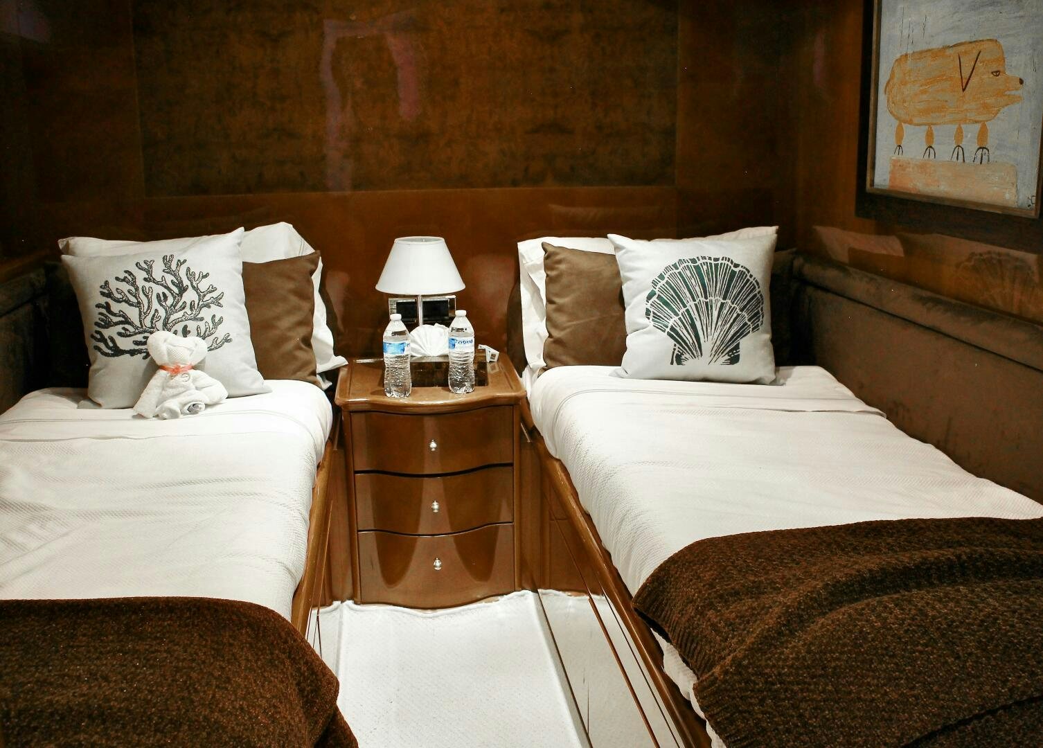 a couple of beds in a room aboard GARI Yacht for Sale