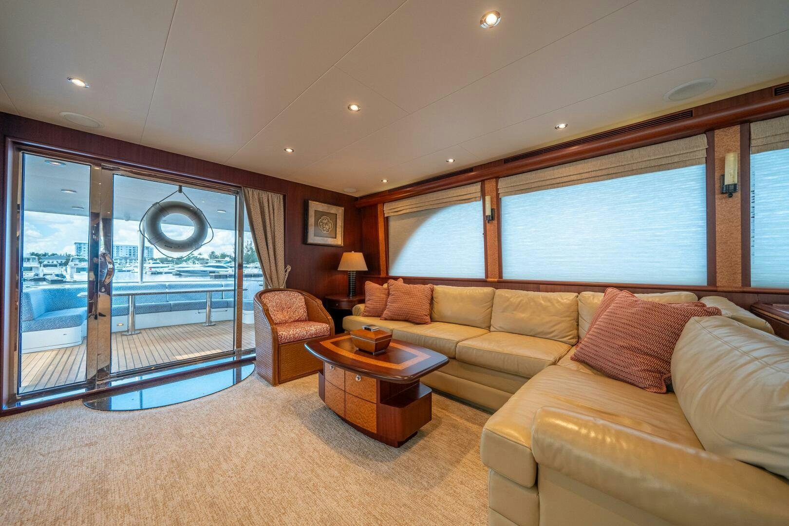 a living room with a large window aboard E Yacht for Sale