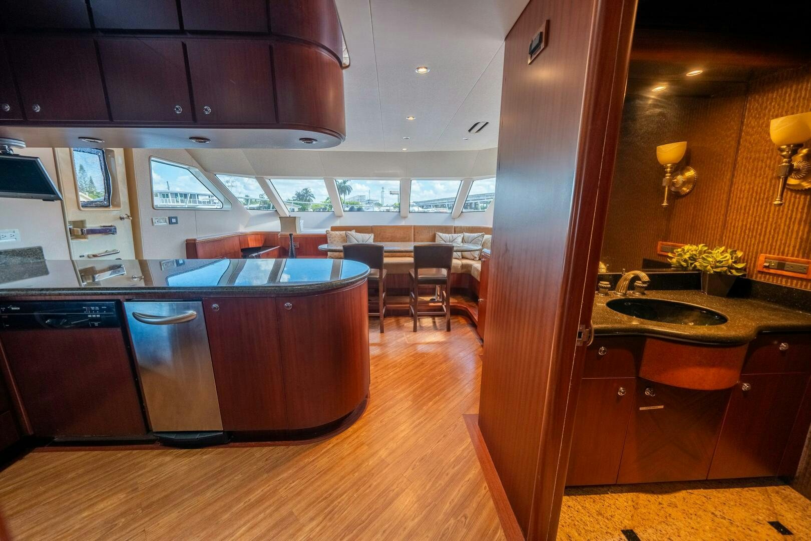a kitchen with a large island aboard E Yacht for Sale