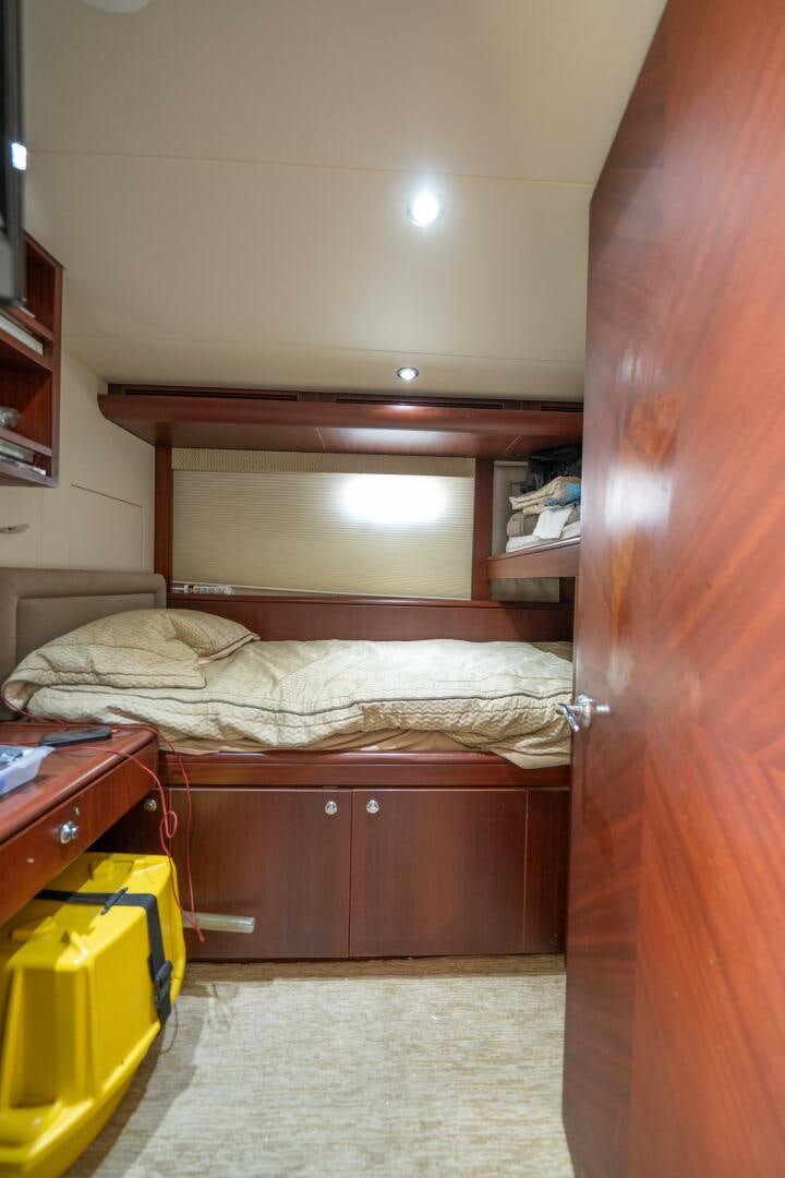 a bedroom with a bunk bed aboard E Yacht for Sale
