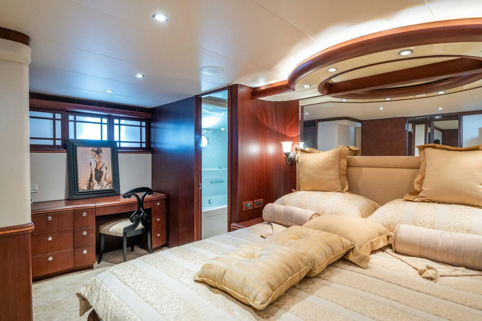 a bedroom with a bed and a tv aboard E Yacht for Sale