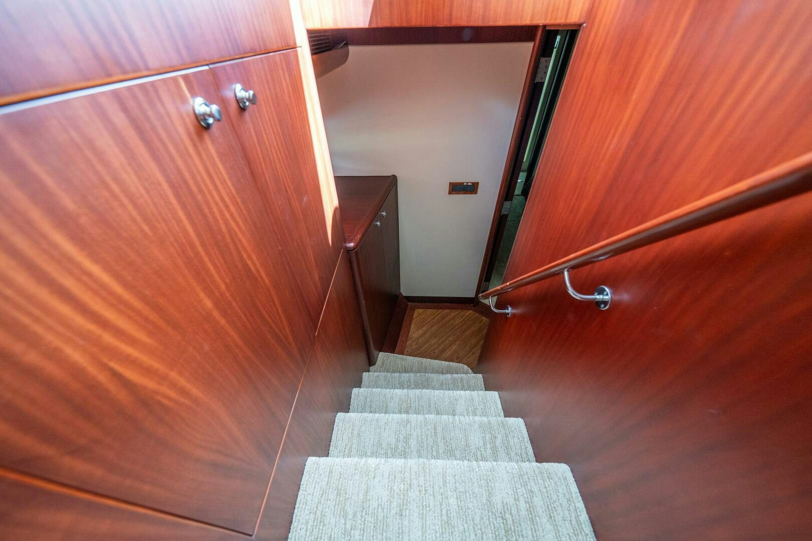 a bed in a room aboard E Yacht for Sale