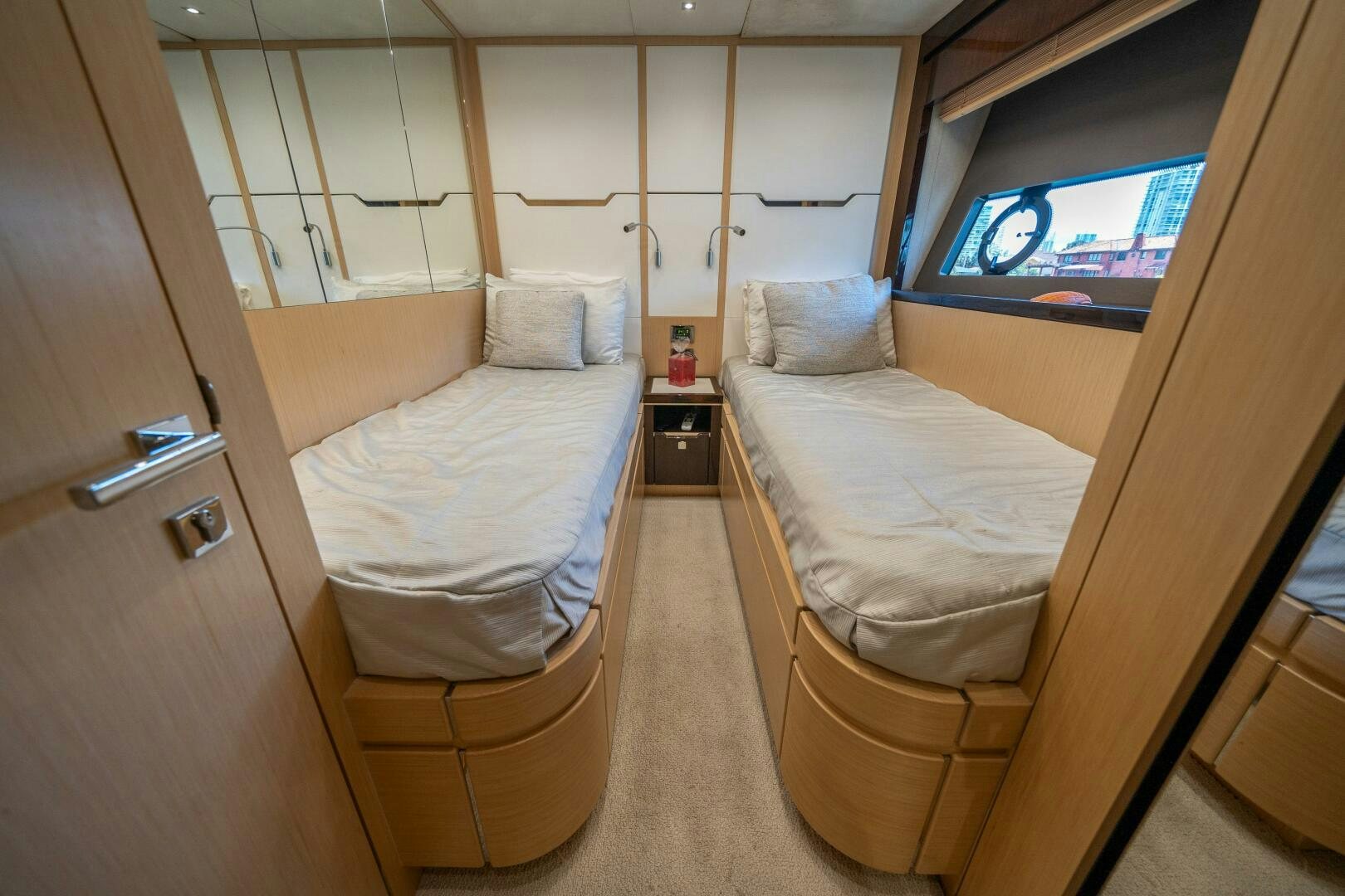 a room with two beds aboard MYLE Yacht for Sale