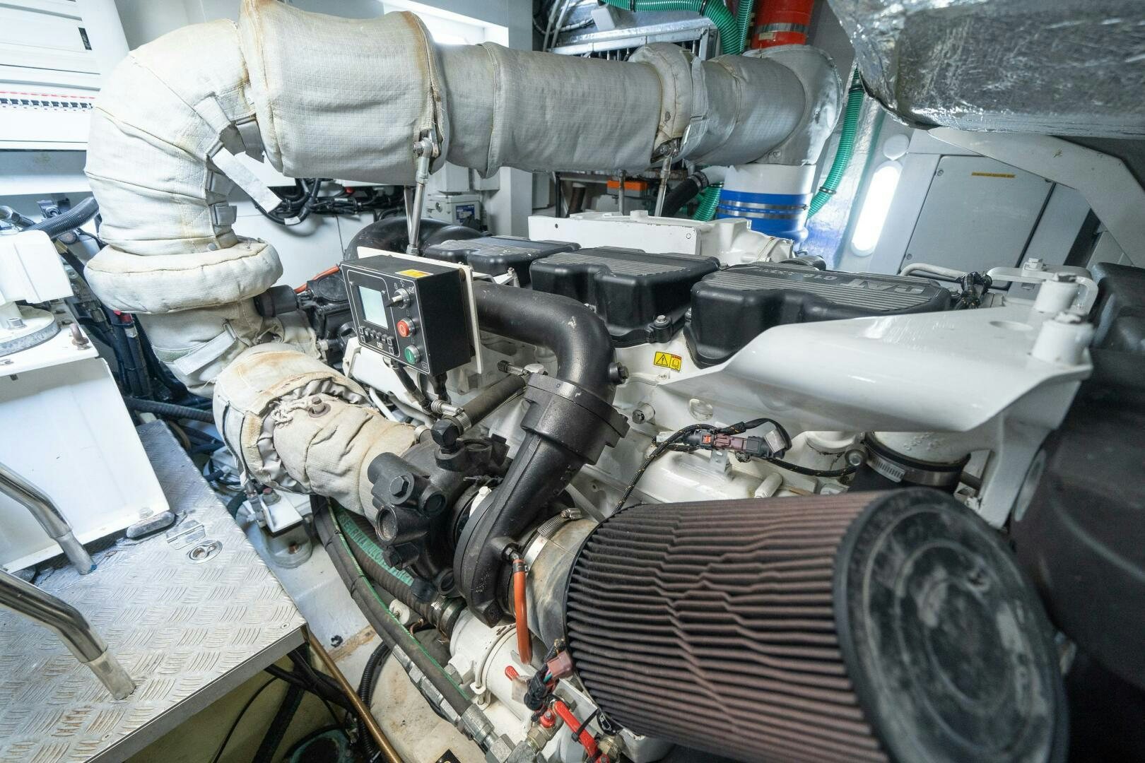 a person working on a car aboard MYLE Yacht for Sale