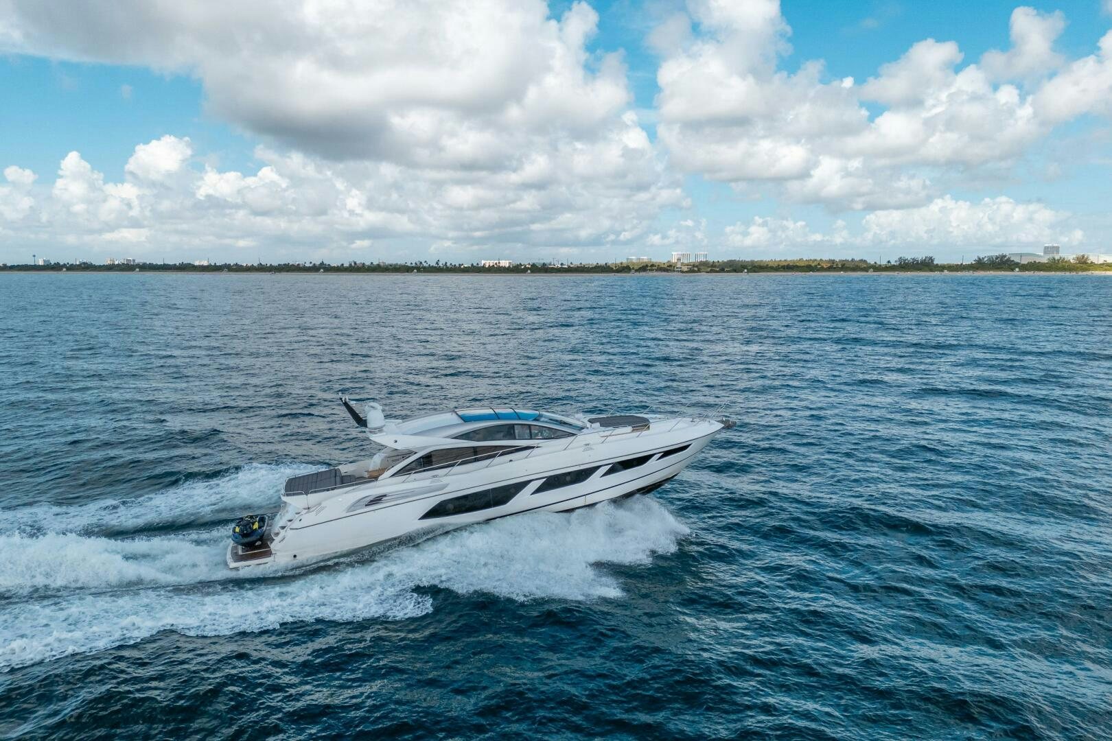 a white boat in the water aboard MYLE Yacht for Sale