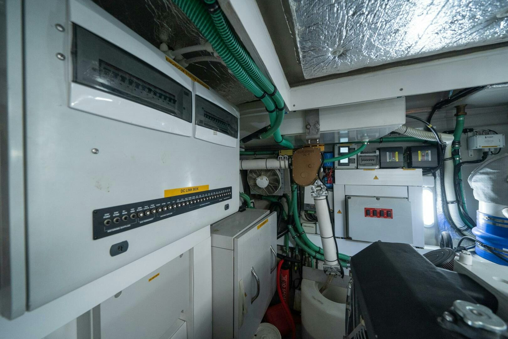 a machine with a large piece of equipment in it aboard MYLE Yacht for Sale